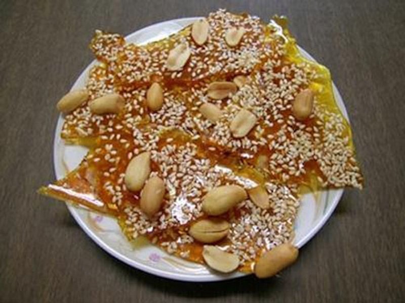 Nguồn Gốc và Ý Nghĩa Văn Hóa của Kẹo Gương Quảng Ngãi